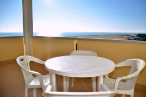 Experience the beach breeze in our bright flat